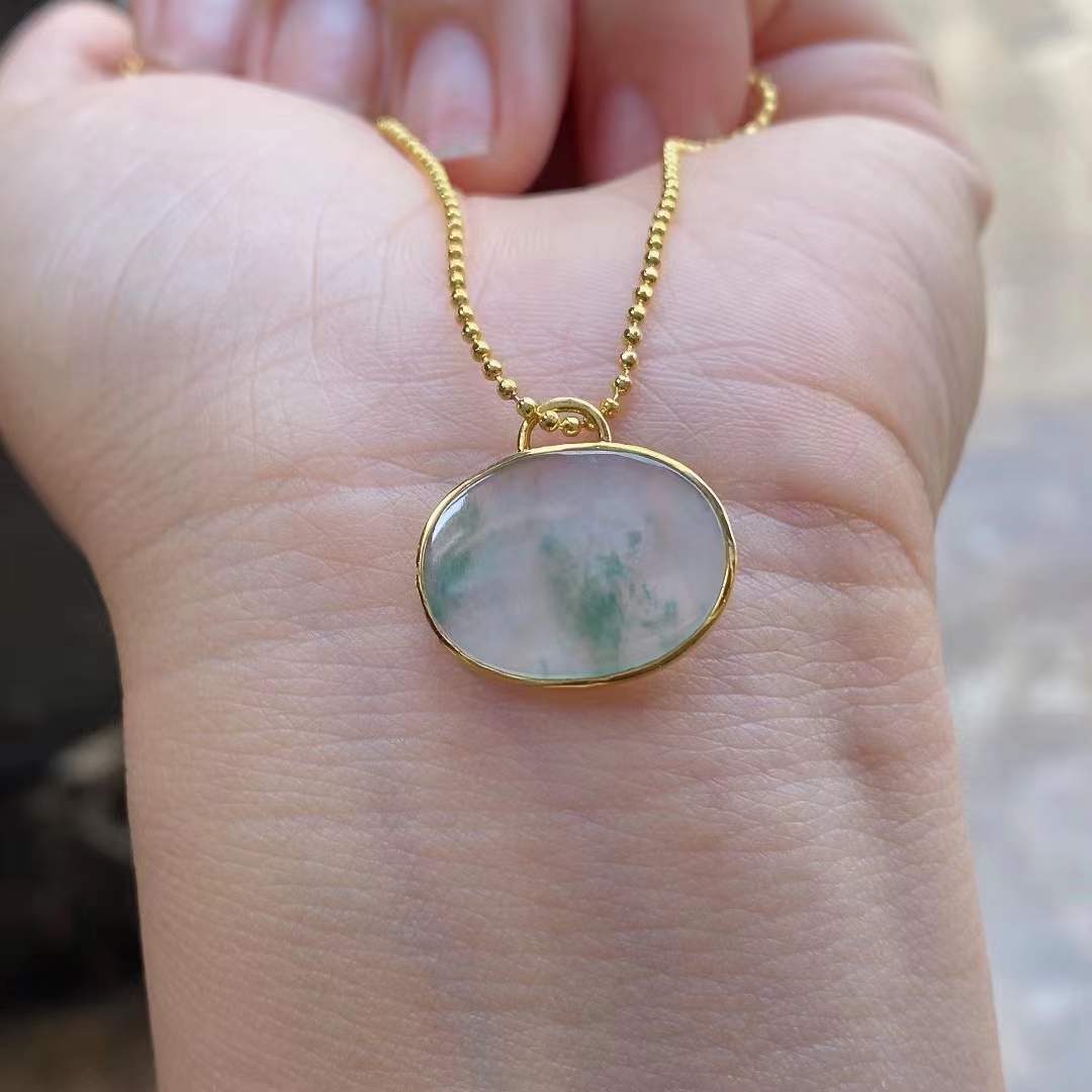 Oval Shaped Jade Pendant - 18k Gold