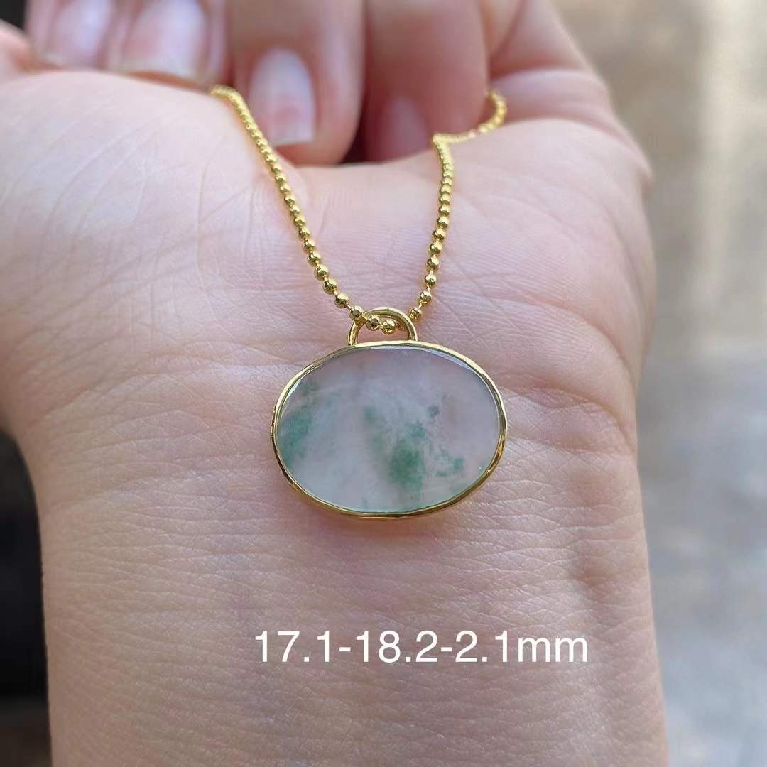 Oval Shaped Jade Pendant - 18k Gold