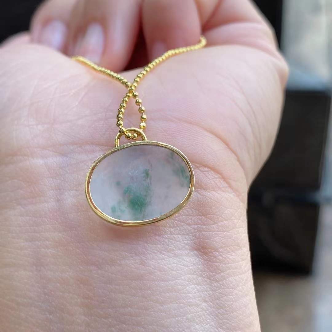 Oval Shaped Jade Pendant - 18k Gold